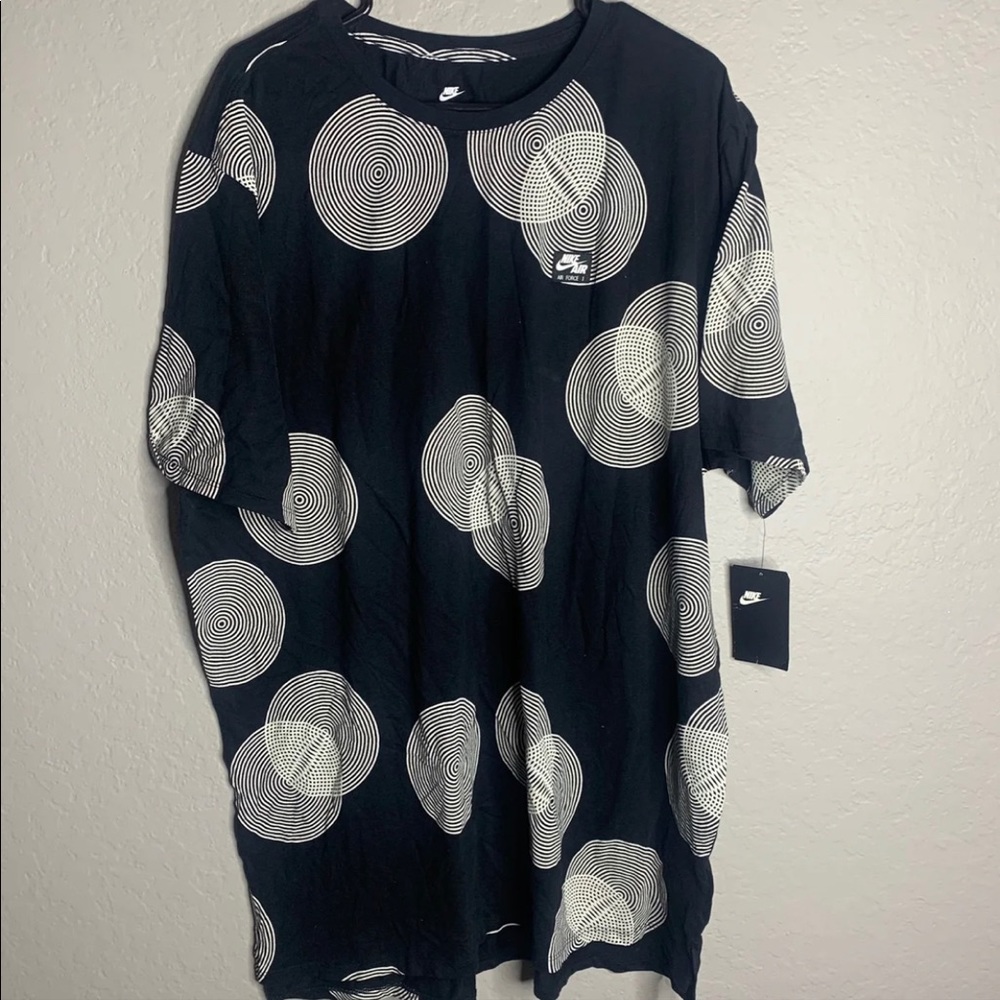 The black and white nike Tee